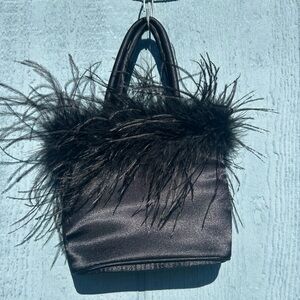 Elegant black satin evening handbag feathered trim. EUC